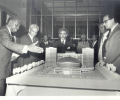 The second ECA Executive Secretary, Robert K.A Gardiner of Ghana, demonstrating the model of the ECA Building to Emperor Haile Selassie I.