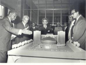 The second ECA Executive Secretary, Robert K.A Gardiner of Ghana, demonstrating the model of the ECA Building to Emperor Haile Selassie I.